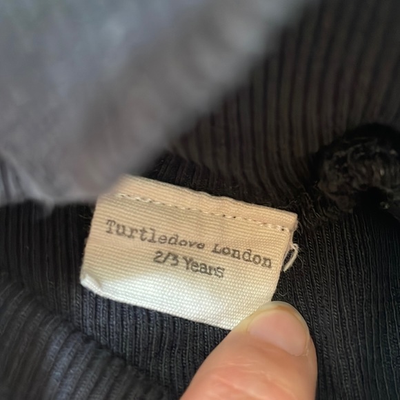 Toddler outfit. Black turtleneck and skirt. Turtledove London 2/3 - Picture 2 of 3